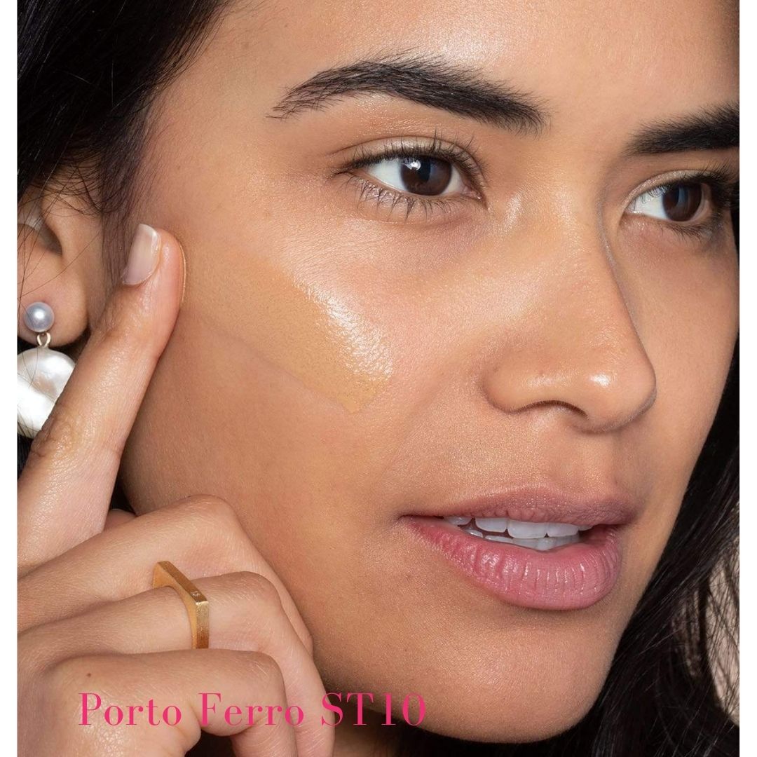 ILIA Super Serum Skin Tint SPF 40 ST10 Porto Ferro: (for medium skin with golden undertones) on model- AILLEA