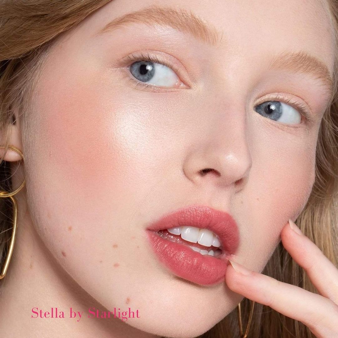 ILIA Illuminator in Stella by Starlight on Model&#39;s Cheek- Rose Gold Highlight - AILLEA