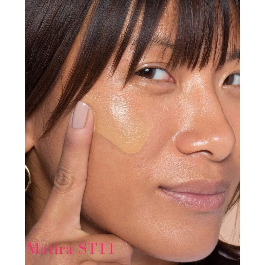 ILIA Super Serum Skin Tint SPF 40 ST11 Matira: (for medium-tan skin with cool undertones) on model- AILLEA