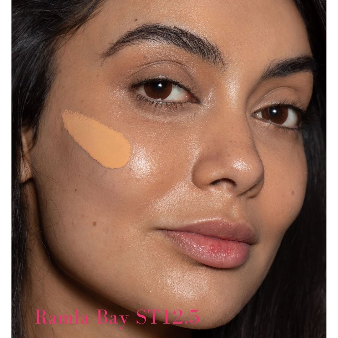 ILIA Super Serum Skin Tint SPF 40 ST12.5 Ramla Bay: (for tan skin with golden undertones) on model - AILLEA