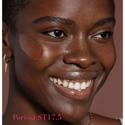 ILIA Super Serum Skin Tint SPF 40 - ST17.5 Perissa: (for deep skin with golden undertones) on model - AILLEA