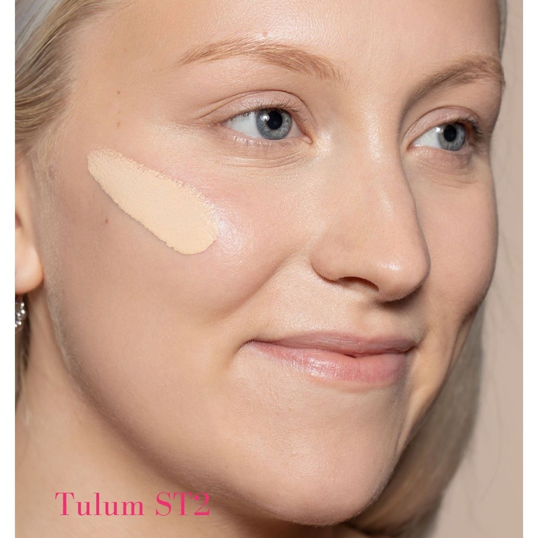ILIA Super Serum Skin Tint SPF 40 - ST2 Tulum: (for fair skin with warm undertones) on model - AILLEA